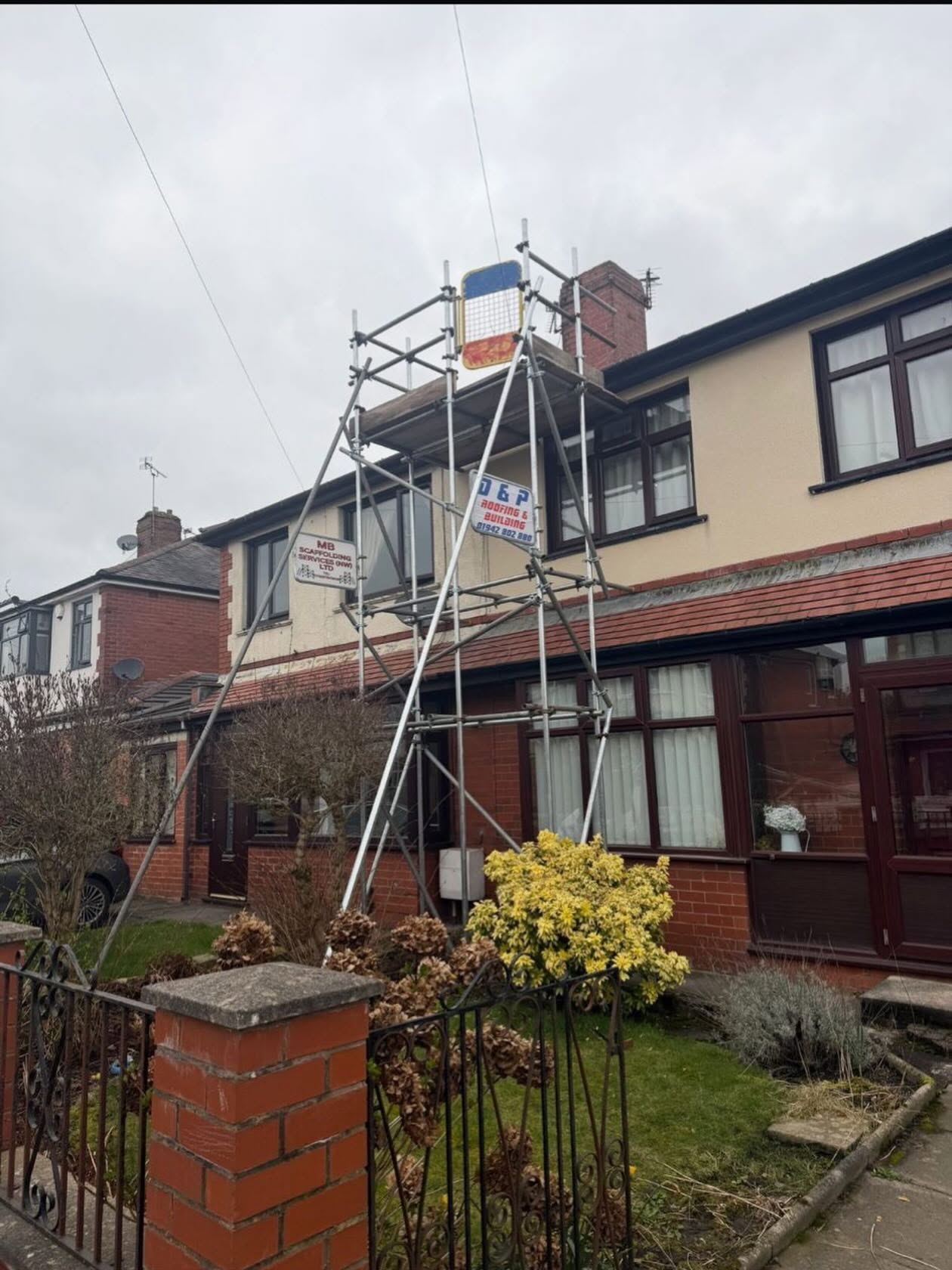 Scaffold up around a semi-detached house