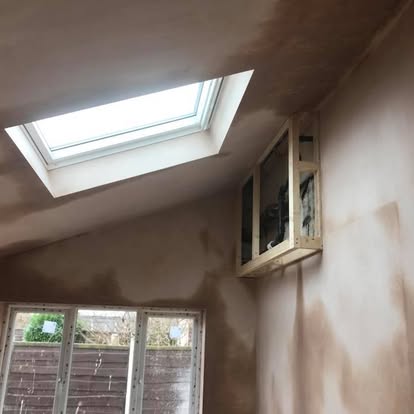 New extension with roof windows, plastering complete